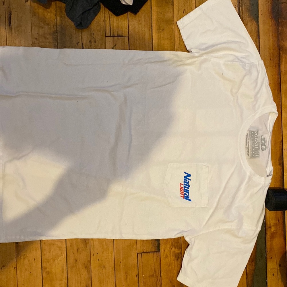 Natural light pocket tee never worn